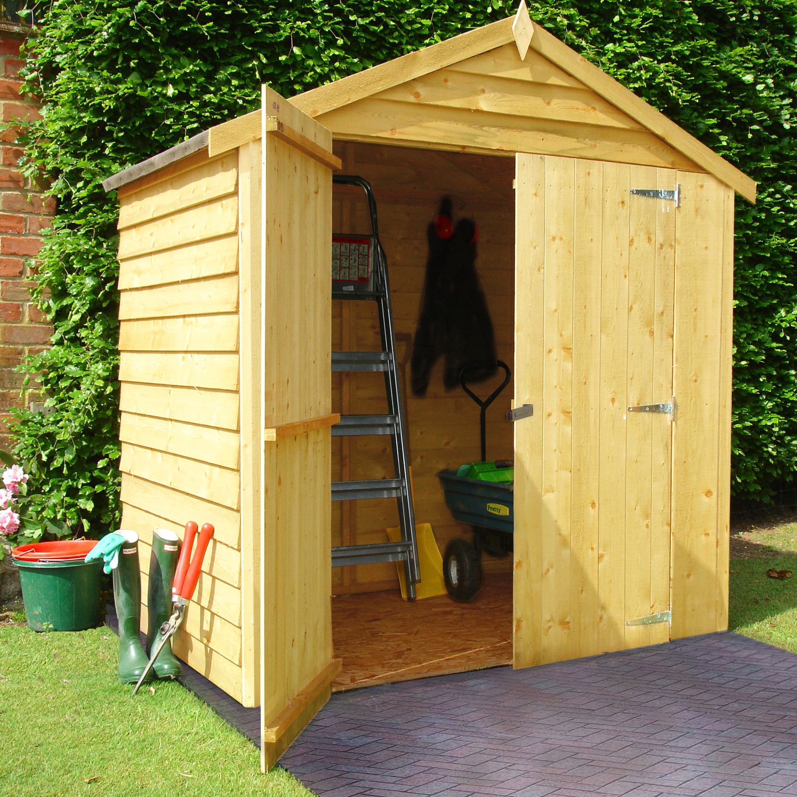 We converted a shed into a tiny house for our family-of-four – it had no water or electrics but we’ve transformed it