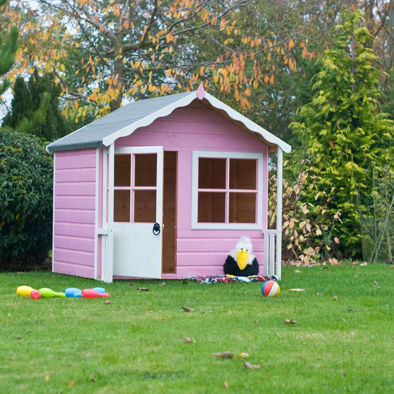 pink wooden wendy house