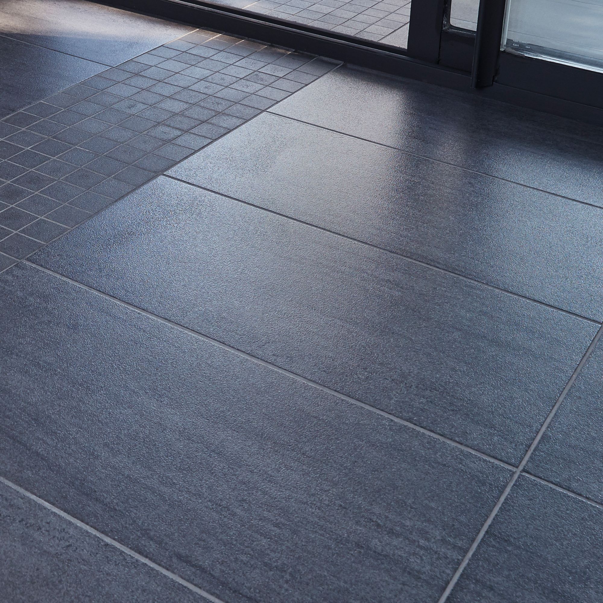Arbace Black Semi-gloss Stone effect Porcelain Indoor Wall & floor Tile, Pack of 9, (L)610mm (W)310mm