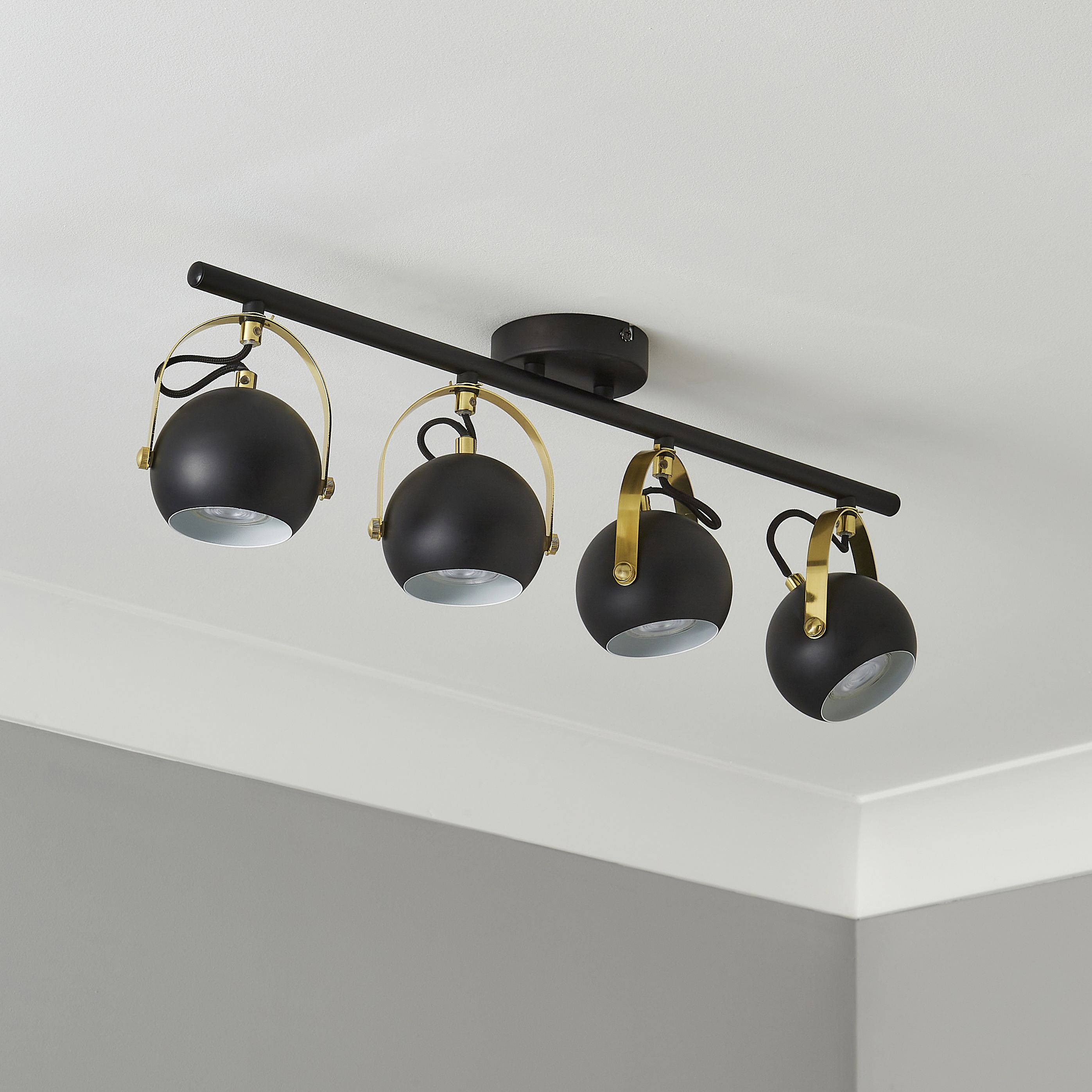 Azure Matt Black Brass effect 4 Light Spotlight bar