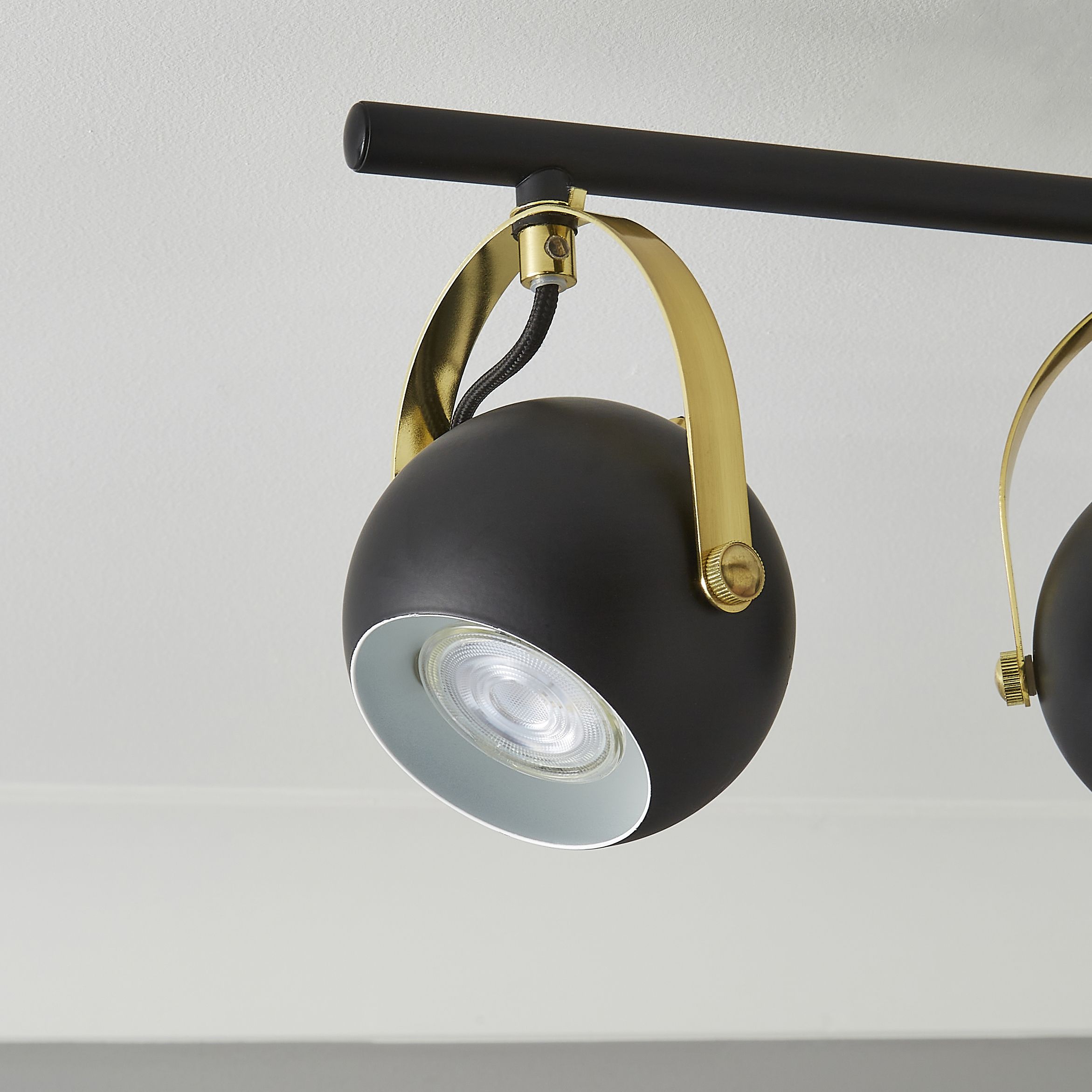 Azure Matt Black Brass effect 4 Light Spotlight bar