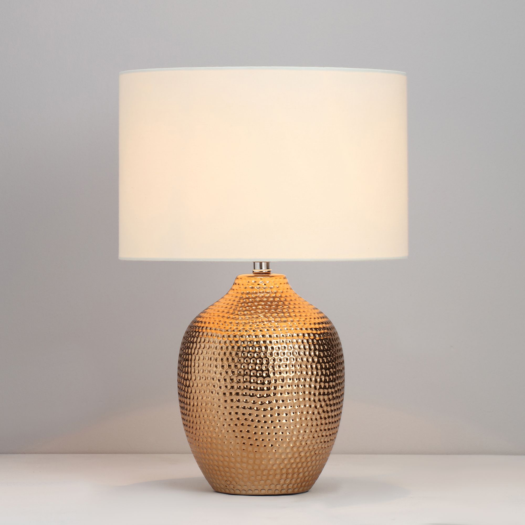 Gold hammered store table lamp